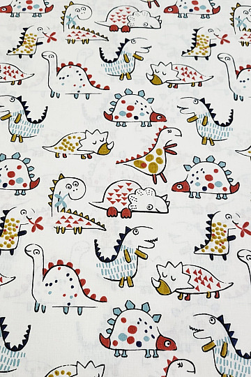 Bavlnená látka DINOSAURI bílá