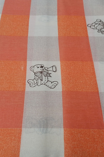 Bavlnená látka Medvede káro - oranžová