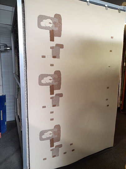 Vlnený koberec svetlo béžový