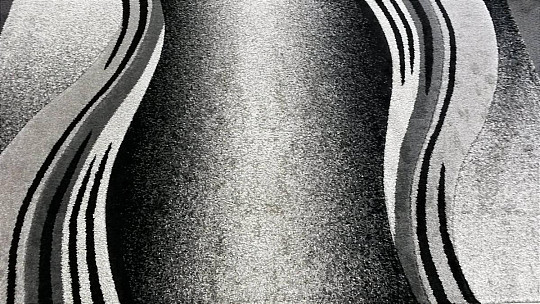 Kusový koberec ENIGMA sivý